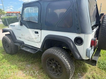 1997 Jeep Wrangler SE - miniatura 4