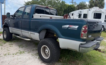 1999 Ford Super Duty F-250 XL Extended Cab Medium Bed w/Rear Doors - car from the USA, Manheim Buy-Now listing at AUTOMAX
