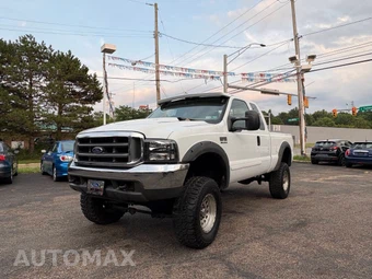 2000 Ford Super Duty F-350 Lariat Extended Cab Medium Bed w/Rear Doors - car from the USA, Manheim Buy-Now listing at AUTOMAX