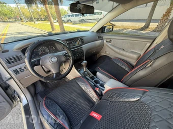2003 Toyota Corolla CE - miniatura 11