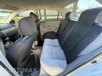 2003 Toyota Corolla CE - miniatura 9