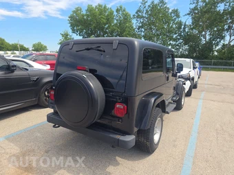 2006 Jeep Wrangler Unlimited LWB - miniatura 4