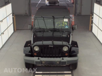 2007 Jeep Wrangler Unlimited Sahara - miniatura 2