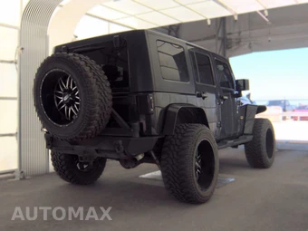 2007 Jeep Wrangler Unlimited Sahara - miniatura 4