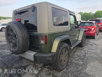 2009 Jeep Wrangler Sahara - miniatura 4