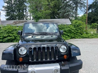 2009 Jeep Wrangler Sahara - miniatura 2