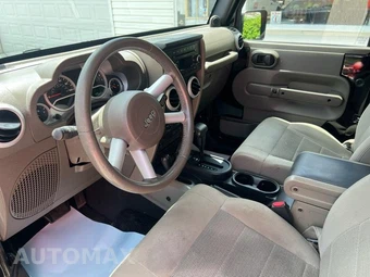 2009 Jeep Wrangler Sahara - miniatura 7