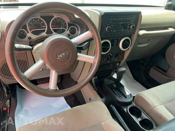 2009 Jeep Wrangler Sahara - miniatura 8
