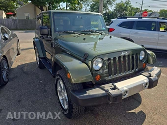 2009 Jeep Wrangler Sahara - miniatura 4