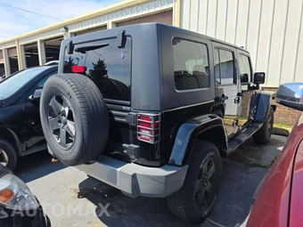 2009 Jeep Wrangler Unlimited Sahara – miniatura 3