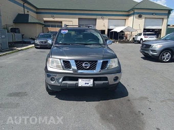 2009 Nissan Frontier LE Crew Cab Medium Bed - car from the USA, Manheim Buy-Now listing at AUTOMAX