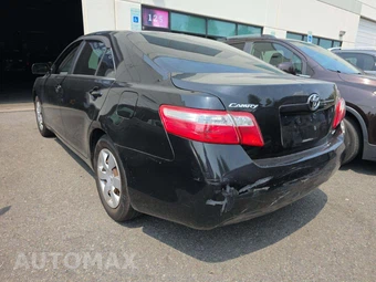2009 Toyota Camry LE - miniatura 2