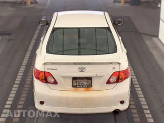 2009 Toyota Corolla - miniatura 5