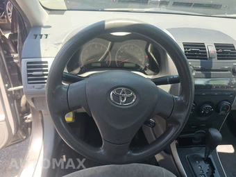 2009 Toyota Corolla - miniatura 10