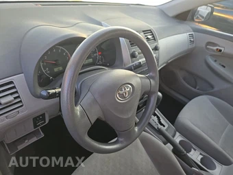 2009 Toyota Corolla LE - miniatura 10