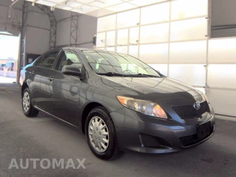 2009 Toyota Corolla LE - miniatura 3