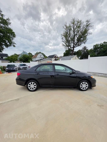 2009 Toyota Corolla LE - miniatura 3