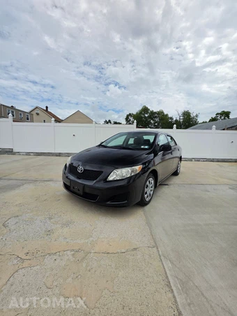 2009 Toyota Corolla LE - miniatura 4