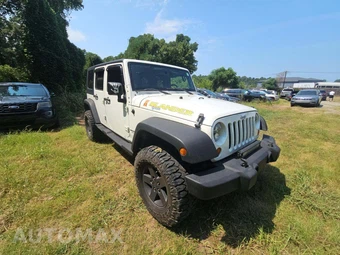 2010 Jeep Wrangler Unlimited Islander Edition - miniatura 4