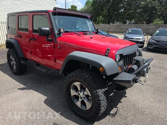 2010 Jeep Wrangler Unlimited Rubicon - miniatura 4