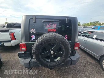 2010 Jeep Wrangler Unlimited Rubicon - miniatura 5