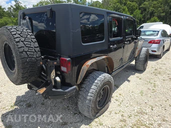 2010 Jeep Wrangler Unlimited Rubicon - miniatura 4