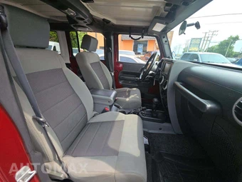 2010 Jeep Wrangler Unlimited Sahara - miniatura 18