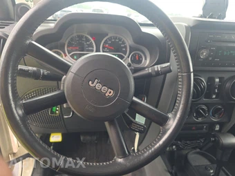 2010 Jeep Wrangler Unlimited Sahara - miniatura 10