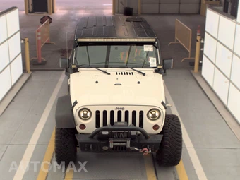 2010 Jeep Wrangler Unlimited Sahara - miniatura 2