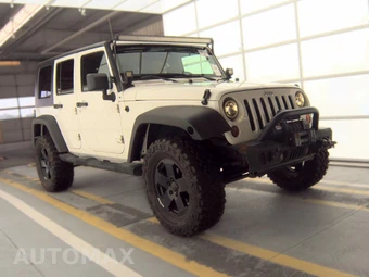 2010 Jeep Wrangler Unlimited Sahara - miniatura 3