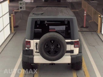 2010 Jeep Wrangler Unlimited Sahara - miniatura 5
