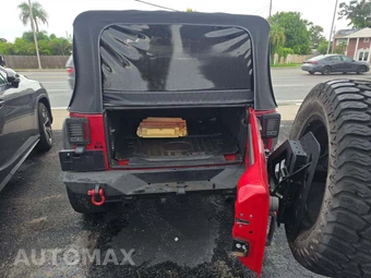 2010 Jeep Wrangler Unlimited Sport - miniatura 14