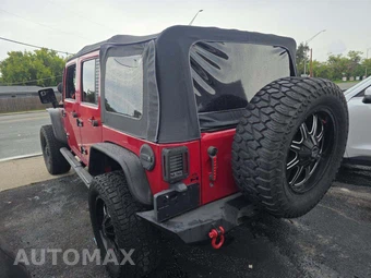 2010 Jeep Wrangler Unlimited Sport - miniatura 2