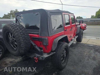 2010 Jeep Wrangler Unlimited Sport - miniatura 3