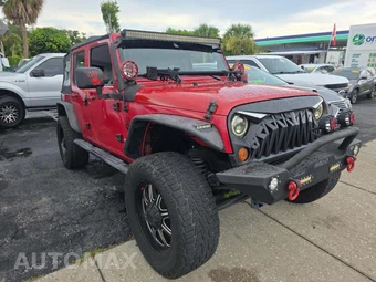 2010 Jeep Wrangler Unlimited Sport - miniatura 4