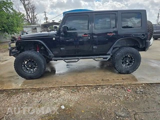 2010 Jeep Wrangler Unlimited Sport - miniatura 3