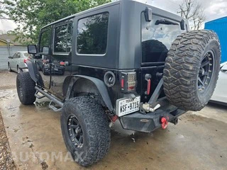 2010 Jeep Wrangler Unlimited Sport - miniatura 4