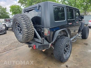 2010 Jeep Wrangler Unlimited Sport - miniatura 5