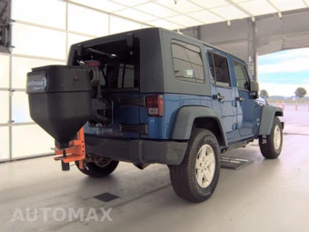2010 Jeep Wrangler Unlimited Sport - miniatura 4
