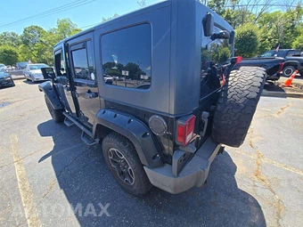 2010 Jeep Wrangler Unlimited Sport - miniatura 2