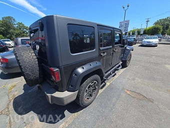 2010 Jeep Wrangler Unlimited Sport - miniatura 3