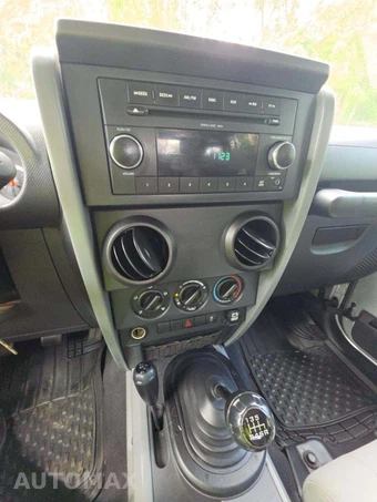 2010 Jeep Wrangler Unlimited Sport - miniatura 10