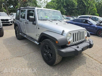 2010 Jeep Wrangler Unlimited Sport - miniatura 4