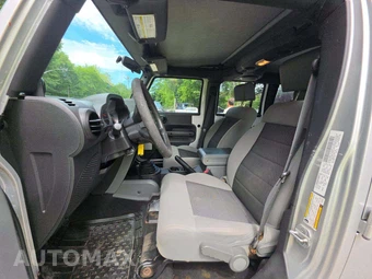 2010 Jeep Wrangler Unlimited Sport - miniatura 6