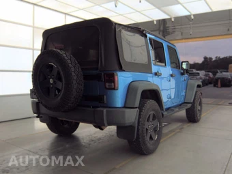2010 Jeep Wrangler Unlimited Sport - miniatura 4