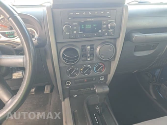 2010 Jeep Wrangler Unlimited Sport - miniatura 11