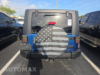 2010 Jeep Wrangler Unlimited Sport - miniatura 5