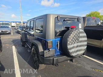 2010 Jeep Wrangler Unlimited Sport - miniatura 6
