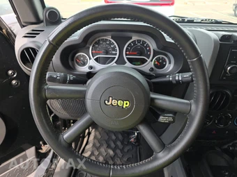 2010 Jeep Wrangler Unlimited Sport - miniatura 10
