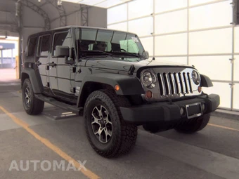 2010 Jeep Wrangler Unlimited Sport - miniatura 3